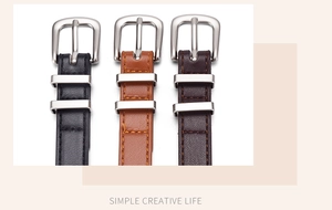 Detailed view of three slim leather belts in black, brown, and dark coffee with silver buckles