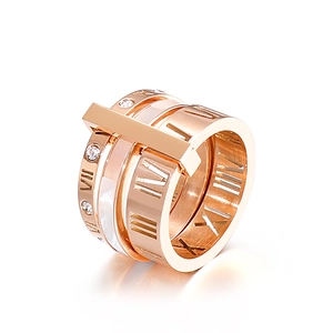 Rose gold hollow Roman numeral ring with small crystals and white ceramic inlay