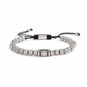 Retro skull charm bracelet with stainless steel beads and adjustable woven cord