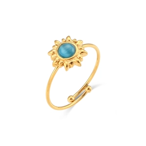 Detail of sun-shaped gold ring with blue opal stone and adjustable open band