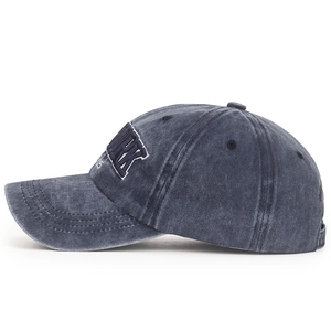Vintage washed navy blue baseball cap with 3D York embroidery and curved brim