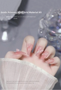 Detailed view of pink butterfly nail charms with white pearls and sparkling crystal dust