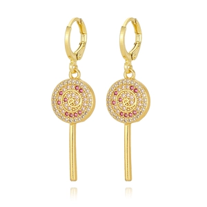 Detailed close-up of lollipop-shaped gold earrings with pink and white rhinestones
