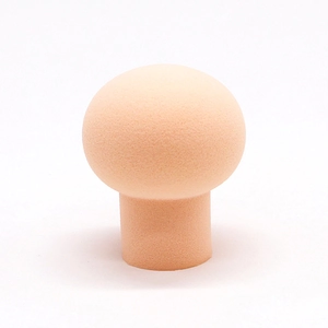 Pink mushroom head makeup sponge blender with soft texture on a clean white background