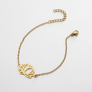 Detail of gold stainless steel bracelet with hollow lotus pendant and adjustable link chain