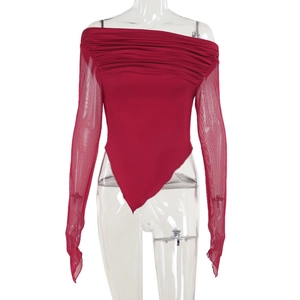 Detail of red off-shoulder top with sheer mesh sleeves and ruched chest design