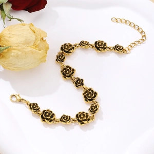 Vintage style rose flower bracelet in antique gold finish with intricate petal design