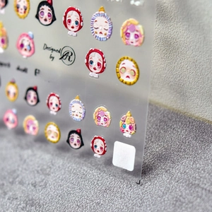 Macro detail of 5D embossed puppet doll nail stickers with 3D relief texture design