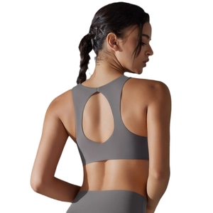 Grey sports bra featuring stylish open-back cutout and high-support elastic fabric