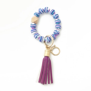 Silicone and wood beaded key ring bracelet with marble beads and purple tassel pendant