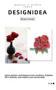 Detailed close-up of a red rose brooch with sparkling crystals and green leaves