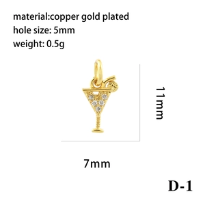 Gold plated cocktail cup pendant with zircon stones and dimensions 11x7mm on white background