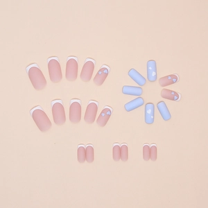 French matte square press-on nails with heart patterns in blue, white, and pink