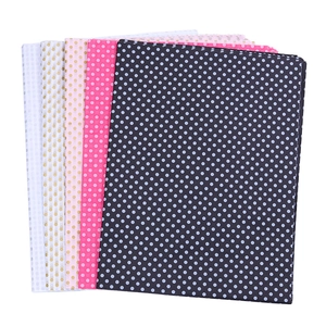 Stack of colorful polka dot pattern tissue wrapping paper for flower bouquets and gifts