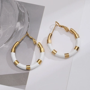 Chic gold and white enamel hoop earrings with a minimalist round water-drop design