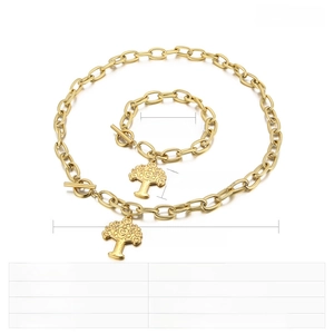 Detailed view of golden stainless steel tree of life pendant set with OT buckle chains