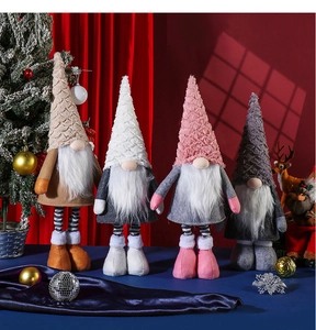 Row of festive Christmas gnomes featuring scale textures and thick white beards on velvet