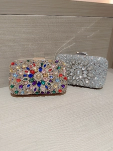 Elegant rhinestone evening clutch bags in gold and silver with colorful crystal patterns