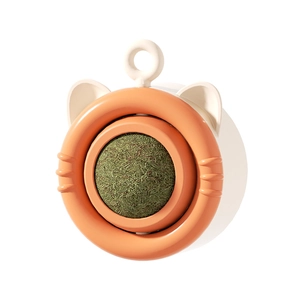 Rotating catnip wall ball toy in orange cat-shaped frame for feline dental health