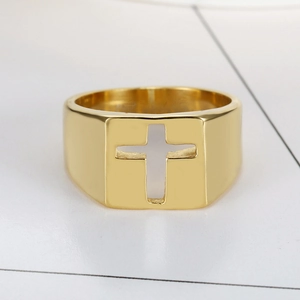 Minimalist gold stainless steel ring with hollow cross cutout design on white background