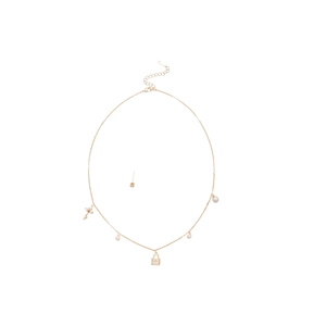 Gold plated necklace and earrings set with pearl, key and lock pendants on white background