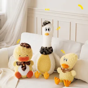 Three plush duck dog toys in various styles displayed on a white sofa in a bright room
