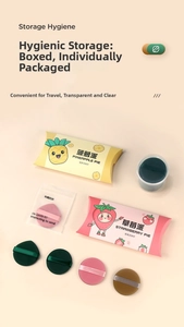 Macro detail of round and teardrop makeup puffs with fruit-themed storage packaging