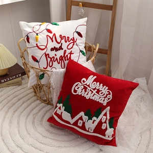 Embroidered Christmas decorative pillows with Merry and Bright and snowy house patterns