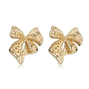 Retro vintage 18K gold plated bow earrings with hollow design on white background