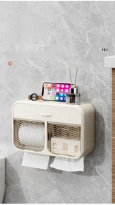 Dual-compartment wall-mounted bathroom tissue box with top shelf on marble wall
