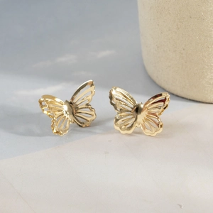 Elegant gold hollow butterfly stud earrings with intricate wing texture for women
