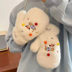 Detail of white plush dachshund mittens with colorful pompoms and neck string