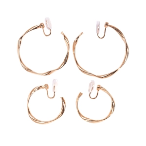 Golden geometric twisted hoop clip-on earrings in large and small sizes on white background