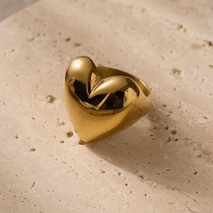 Polished 18K gold plated stainless steel heart ring with a 3D minimalist design