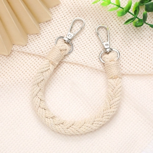 Handmade beige woven wrist strap for phone or bag with silver swivel lobster clasps