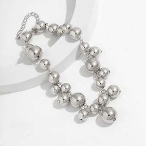 Detail of silver beaded tassel necklace showing adjustable chain and lobster clasp