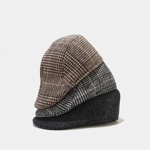 Classic checkered flat caps for men and women in grey and brown plaid autumn wool fabric