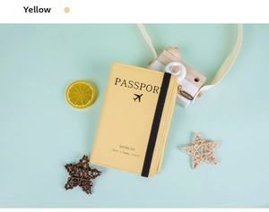 Gelber Reisepasshalter aus PU-Leder mit schwarzem Gummiband und Flugzeug-Icon-Detail