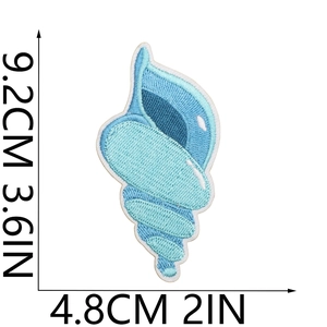 Detail view of blue gradient conch shell embroidery patch with 9.2cm x 4.8cm size markings