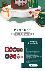 Macro view of Christmas themed press-on nails featuring red green patterns and holiday motifs