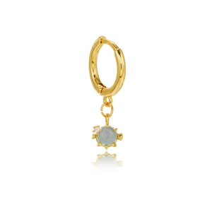 Detail of 18K gold star pendant earring with light blue gemstone and white zircon