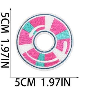 Detailed embroidery view of 5cm round fruit tea patch with pink and teal threads
