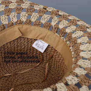 Close-up of the inner adjustable drawstring for size control on a crochet straw hat