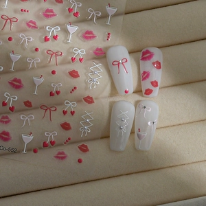5D embossed nail art stickers featuring pink lips, bows, hearts and cocktail glass designs