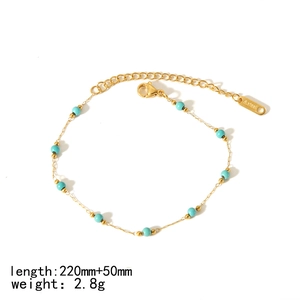 Gold-plated stainless steel anklet with turquoise beads on a clean white background
