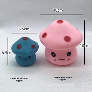 Size comparison of blue and pink mushroom squeeze toys with cute facial expressions