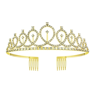 Detailed macro view of golden alloy crown with rhinestones and hair combs for secure fit