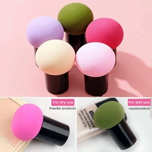 Close-up of colorful mushroom makeup sponges for dry use with powder cosmetics