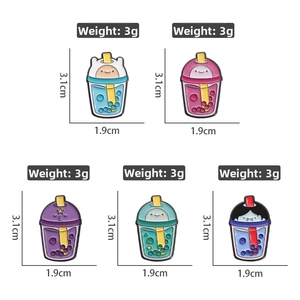 Detailed view of enamel pins showing size dimensions for cartoon soda bottle badges