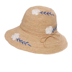 Chic raffia straw sun hat with white 3D flower embroidery and blue leaf details